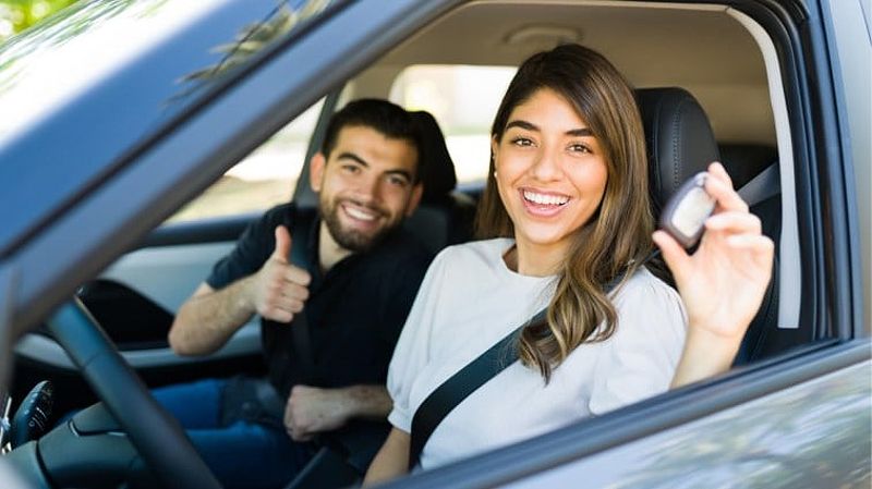 A couple purchasing a car